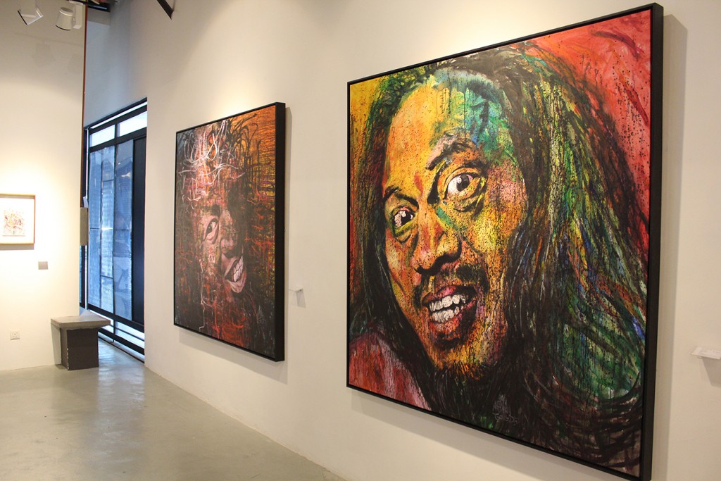 Art pieces for sale through the ARTAID15 fundraiser will be exhibited to the public for ten days beginning 21 August 2015 at Segaris Art Center, Publika, Solaris Dutamas, Kuala Lumpur. Pictured on display are (from left) Bayu Utomo Radjikin's Portrait 2 and Portrait 1.