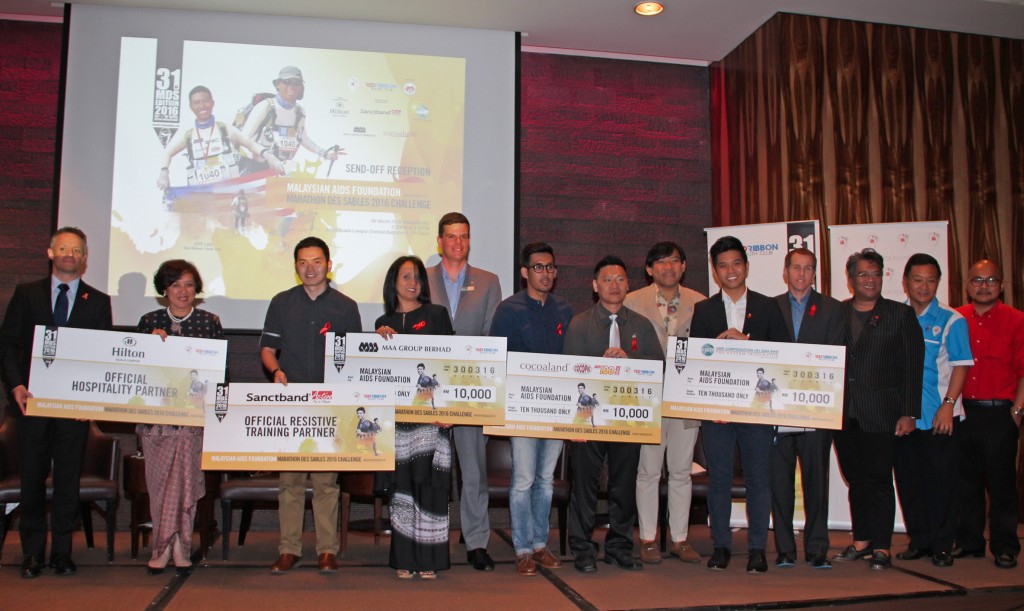 Donors, partners and supporters of the Malaysian AIDS Foundation Marathon des Sables 2016 Challenge join Professor Dr. Adeeba Kamarulzaman, Chairman of the Malaysian AIDS Foundation (second from left) and the Board of Trustees of the Malaysian AIDS Foundation in offering their best wishes to Red Ribbon Youth Icon Jeff Lau (fifth from right) at a send-off reception held at Hilton Kuala Lumpur on 30 March 2016. – Photo © 2016 Malaysian AIDS Foundation.